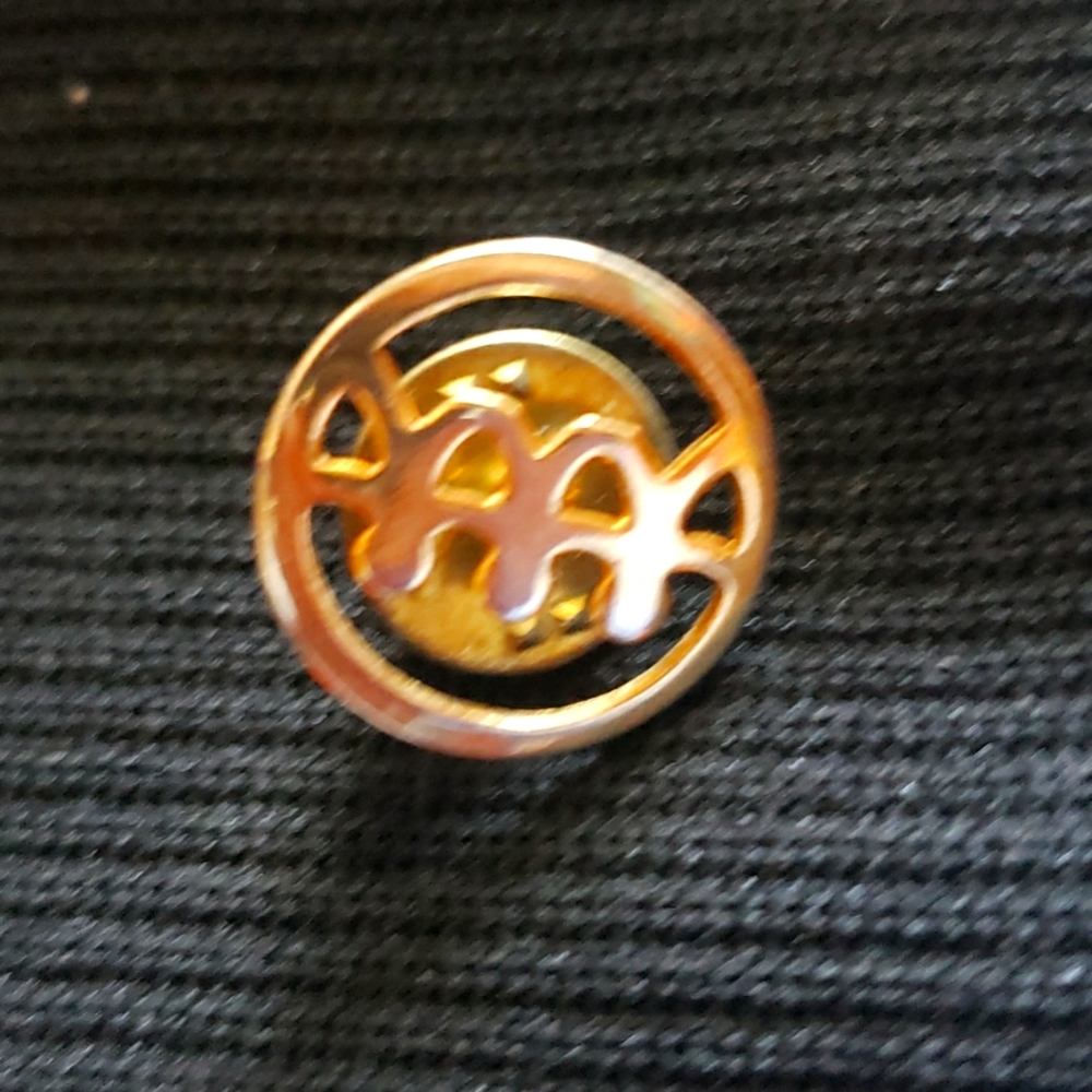 E.A. Adams lapel...